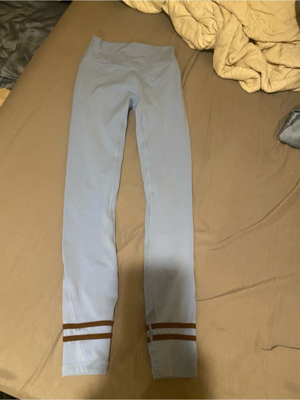 Light Blue High-Rise Performance Leggings with Brown Hem Stripes